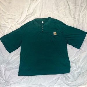 Carhartt XL dark green shirt. Labeled as mens, but can be unisex. Never worn